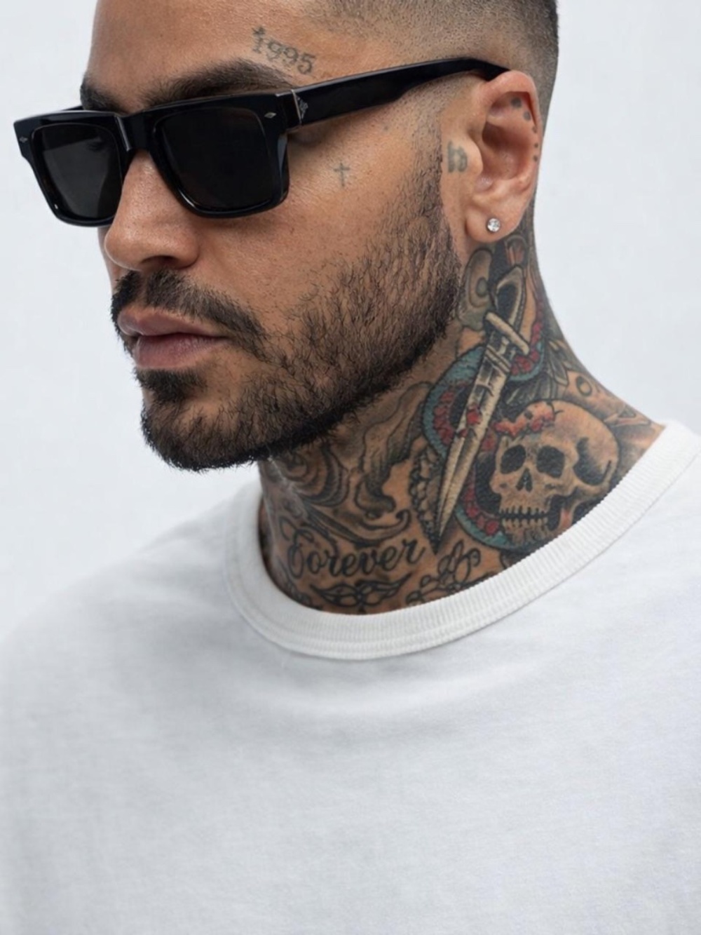 Black square sunglasses with a retro vibe
